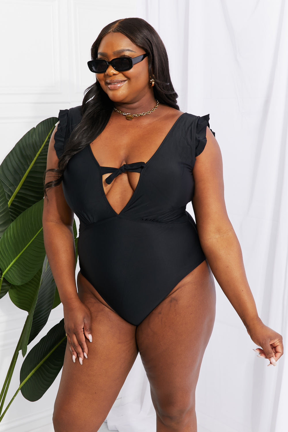 Flirty Backless Ruffle Sleeve One-Piece with Plunging Neckline and Bust Tie