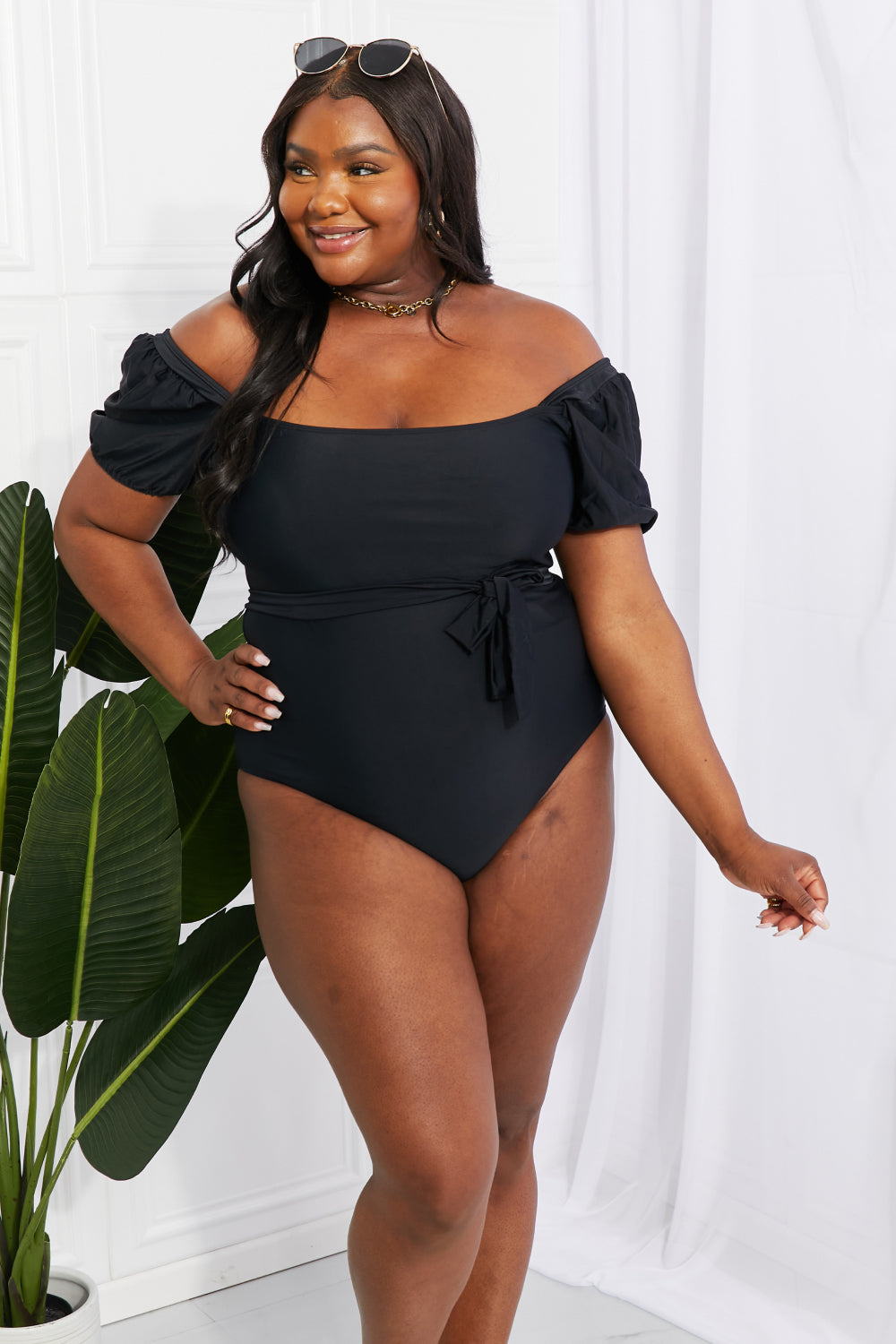 Chic and Stylish: Puff Sleeve One-Piece with Tie Belt
