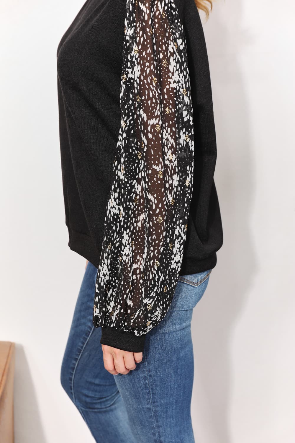 Artful Fusion: Knit Top with Foil-Printed Sleeves