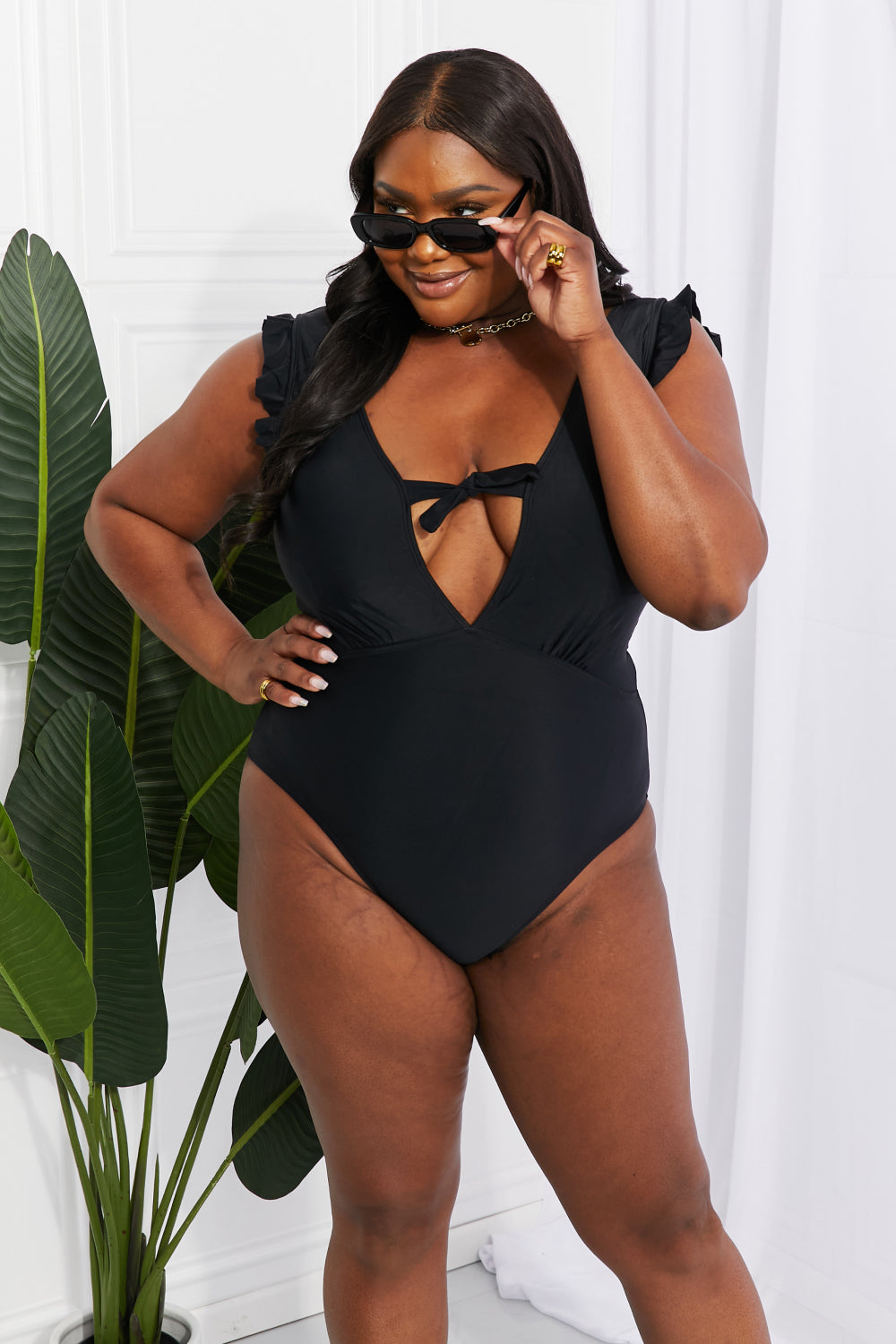 Flirty Backless Ruffle Sleeve One-Piece with Plunging Neckline and Bust Tie