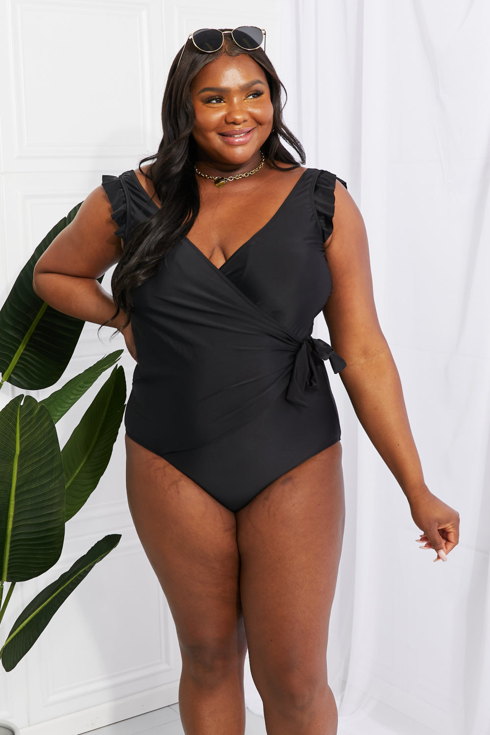 Effortlessly Elegant: Our Black Ruffle Faux Wrap One-Piece Swimsuit