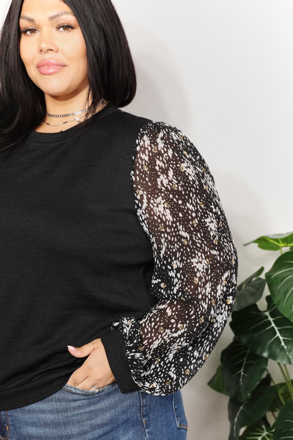 Artful Fusion: Knit Top with Foil-Printed Sleeves
