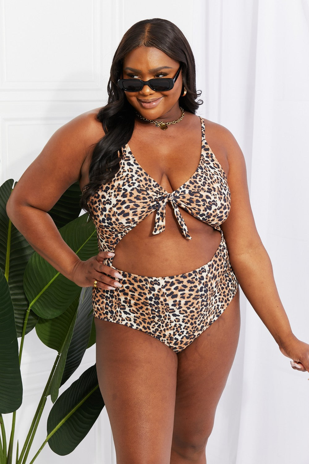 Roar into Summer with our Leopard Cutout One-Piece Swimsuit