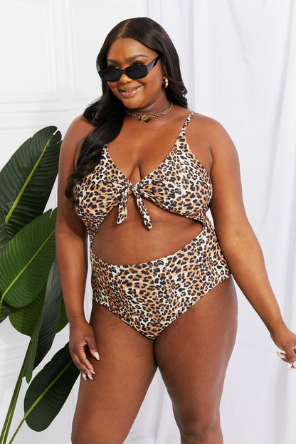 Roar into Summer with our Leopard Cutout One-Piece Swimsuit
