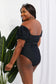 Chic and Stylish: Puff Sleeve One-Piece with Tie Belt