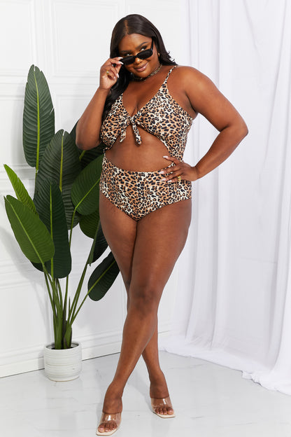 Roar into Summer with our Leopard Cutout One-Piece Swimsuit