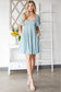 Chic Balloon Sleeve Dress with Square Neck and Crisscross Back Detailing