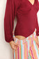 Sophisticated Romance: V-neck Bodysuit with Dramatic Poet Sleeves