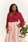 Sophisticated Romance: V-neck Bodysuit with Dramatic Poet Sleeves